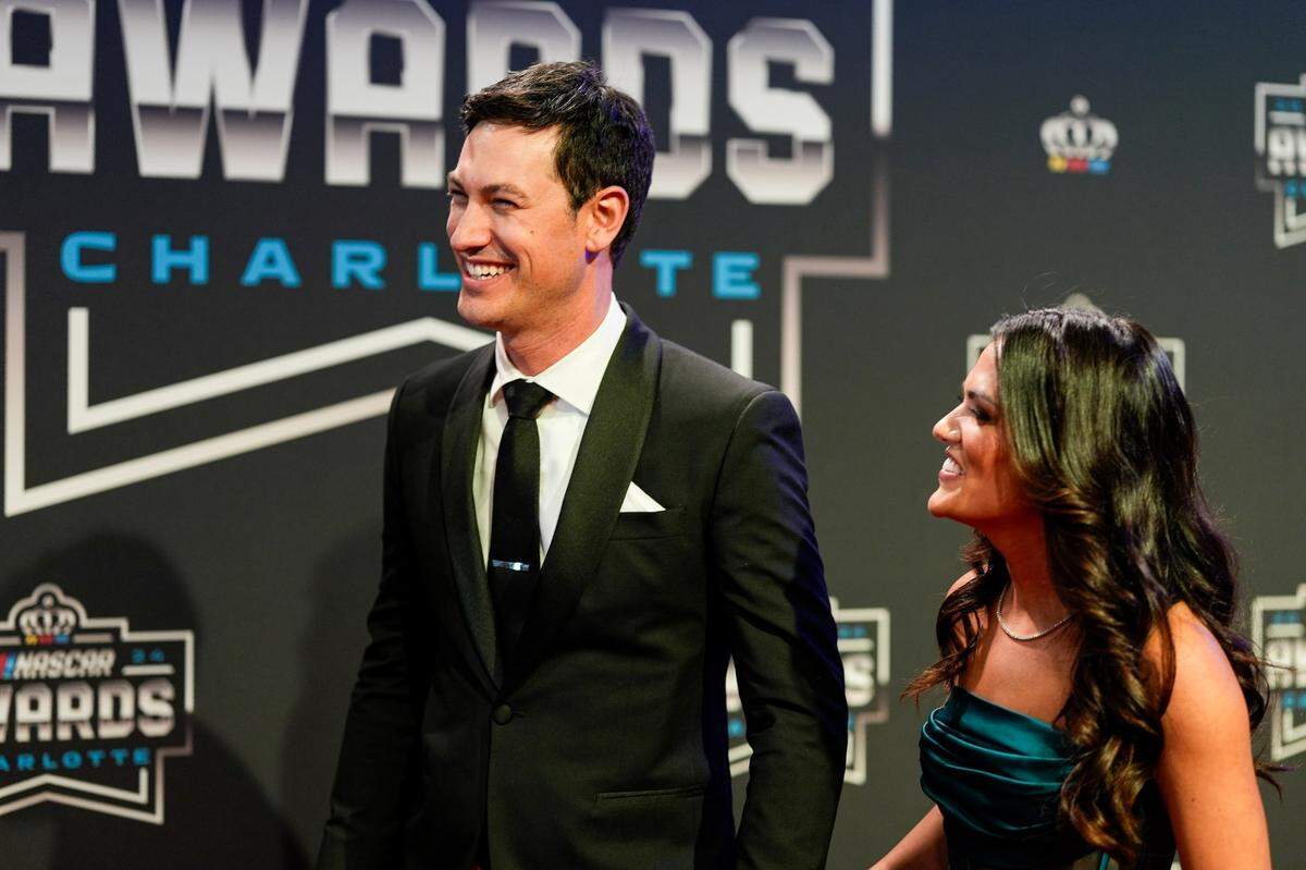Nov 22, 2024; Charlotte, NC, USA; NASCAR Cup Series driver Joey Logano (22) and his wife Brittany at Charlotte Convention Center.