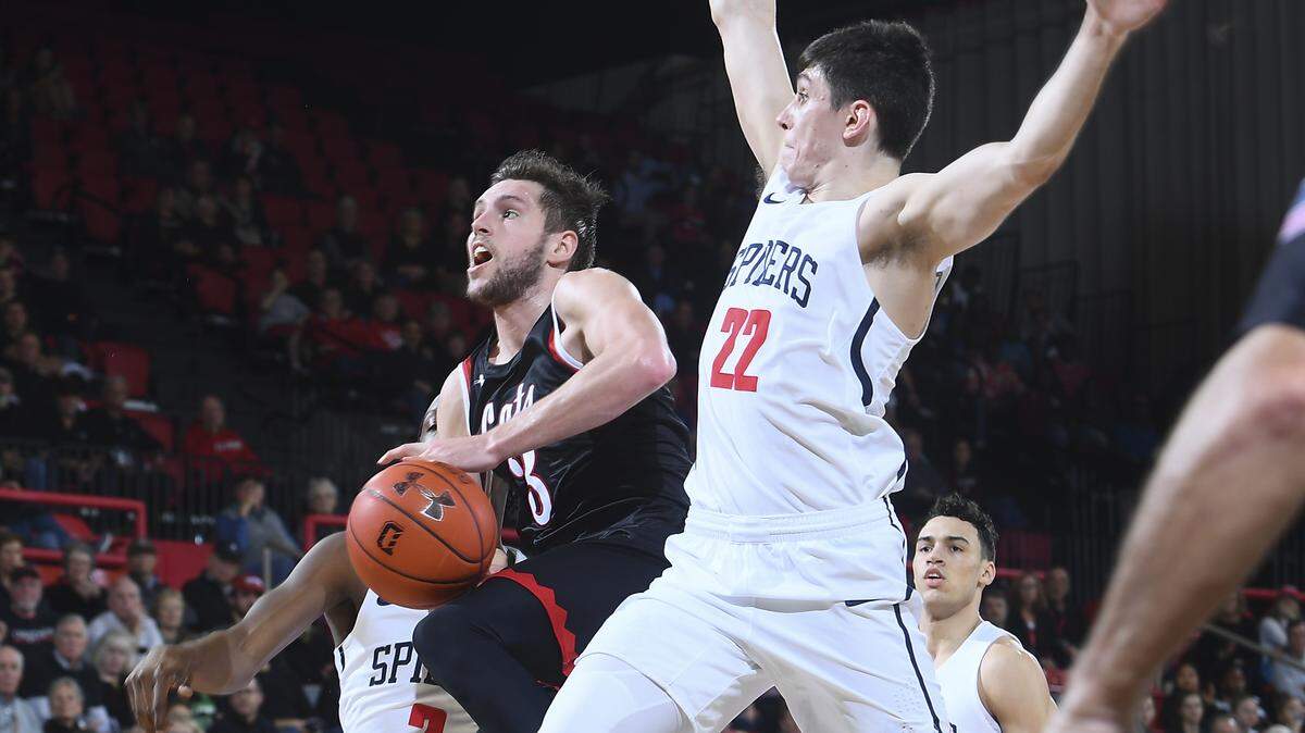Davidson’s Jon Axel Gudmundsson (3) goes to the basket against Richmond.