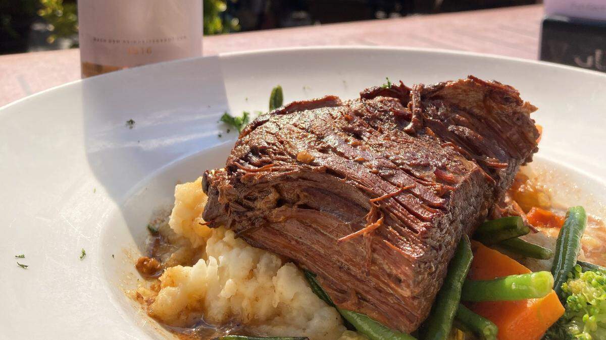 Harp & Crown’s Beef Brisket Beef is braised in Guinness au jus and served with mashed potatoes, onions and seasonal vegetables ($18.95).
