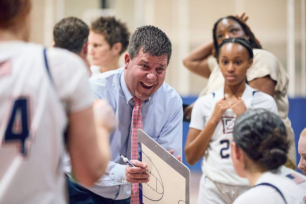 The Providence Day School Chargers head coach Josh Springer gets his team prepared in the second half of their win over Rabun Gap in the NCISAA state semifinals on February 24, 2026.