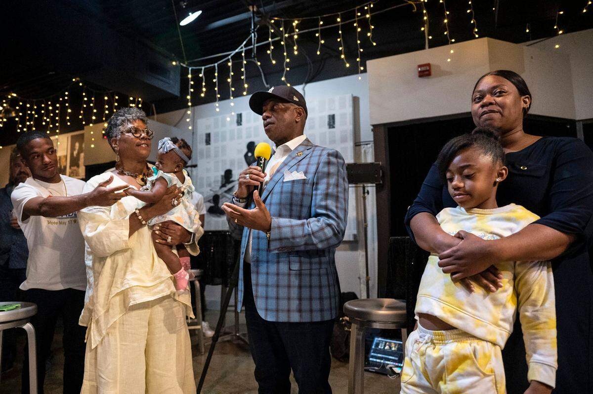 Incumbent Mecklenburg Sheriff Garry McFadden, center, speaks to the crowd at the Black Political Caucus’ watch party at Studio 29 on Tuesday, May 17, 2022 in Charlotte.