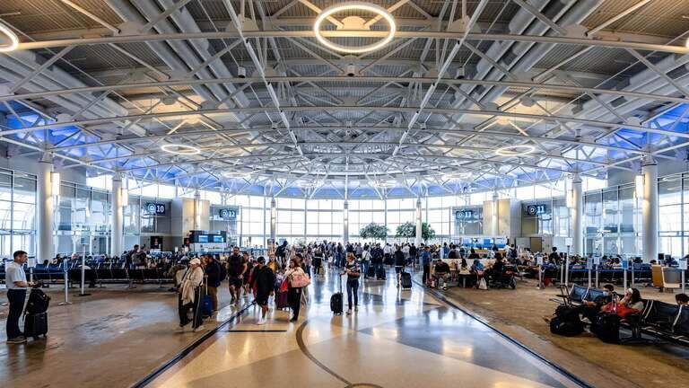 Officials say teen ‘abandoned’ at CLT is actually 18, has been reunited with family