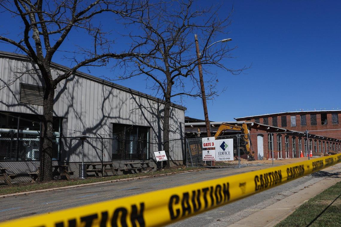 The Savona Mill, a historic textile mill off Turner Avenue pictured in the background, will be repurposed as part of a 27-acre development project being led by Portman Holdings. Blue Blaze Brewing sits at the corner of South Turner Avenue and State Street.
