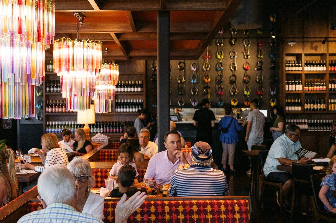 Postino WineCafe, based in Phoenix, will make its North Carolina debut July 19 at The Bowl at Ballantyne, 5210 Bowl St. A 600-square-foot art wall with over 400 multi-colored retro headphones is a nod to The Amp.