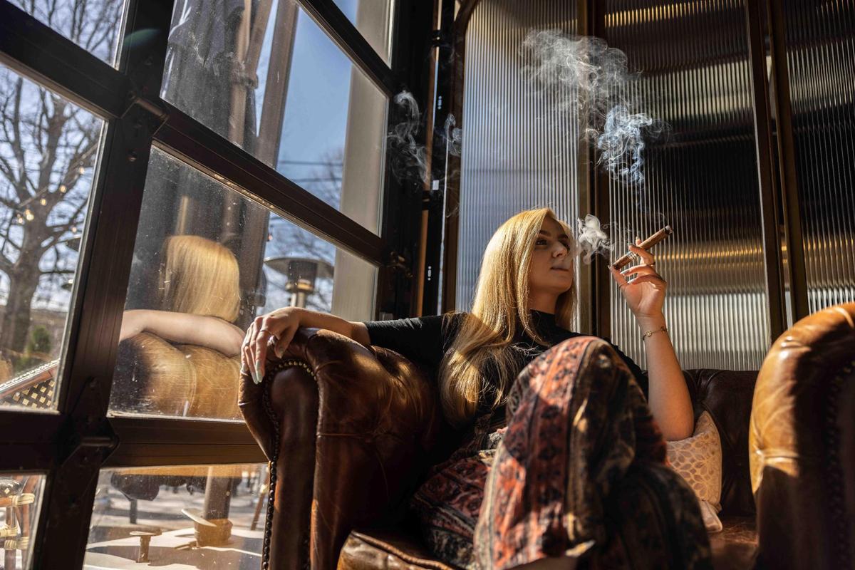 McKenzie Delaney, humidor manager at The Vintage Whiskey & Cigar Bar, says the other three staffers who work the humidor with her are men.