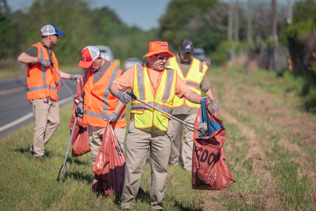 Crews collected nearly 1.5 million pounds of trash from Mecklenburg County roads last year.. That’s an amount that’s steadily risen from 1.05 million just five years ago. In this submitted photo, NCDOT volunteers clean up roads around the state as a part of “litter sweeps” across the state.
