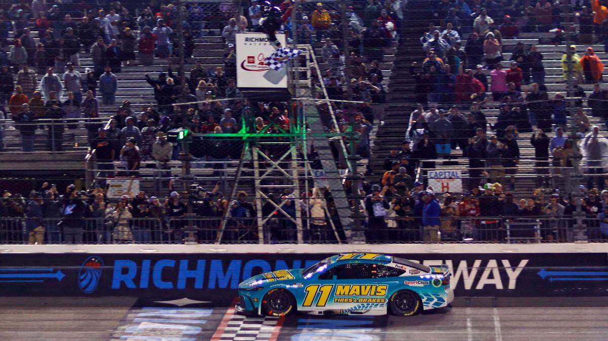 Mar 31, 2024; Richmond, Virginia, USA; NASCAR Cup Series driver Denny Hamlin (11) wins the Toyota Owners 400 at Richmond Raceway.