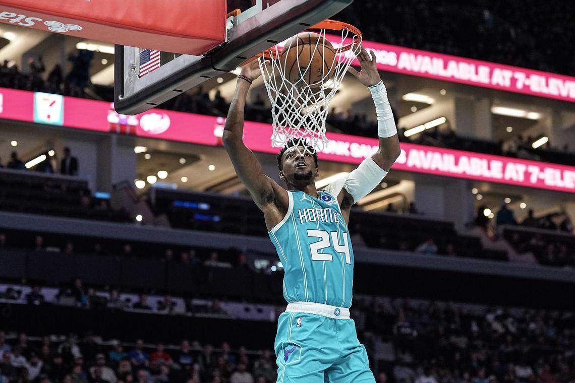 Charlotte Hornets forward Brandon Miller (24) drives to the basket for a slam dunk during the first half of an NBA basketball game against the Dallas Mavericks, Tuesday, March 3, 2026, in Charlotte, N.C.
