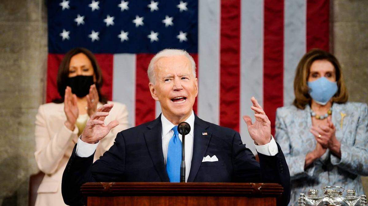 Vice President Kamala Harris, and House Speaker Nancy Pelosi of Calif., stand and applaud as President Joe Biden addresses a joint session of Congress, Wednesday, April 28, 2021, in the House Chamber at the U.S. Capitol.