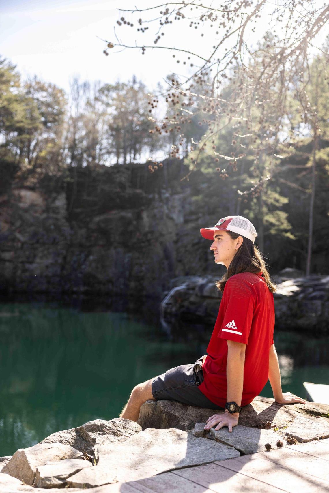 William Carrigan, fifth generation of Mooresville’s Carrigan Farms poses for a portrait by the quarry in Mooresville.