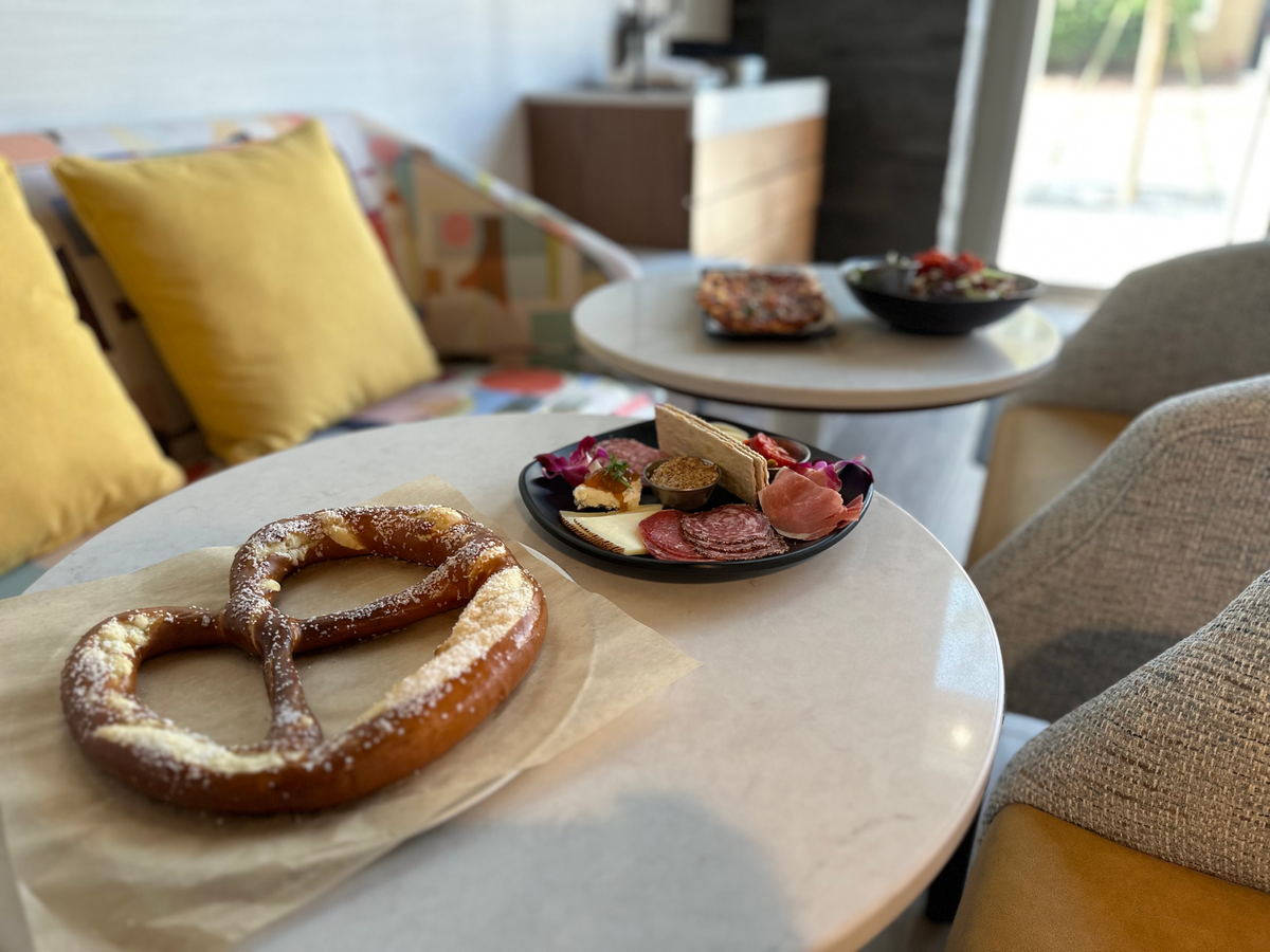 1st Ward Social Bar & Lounge’s menu includes light bites like a jumbo pretzel, served with spicy mustard and beer cheese.