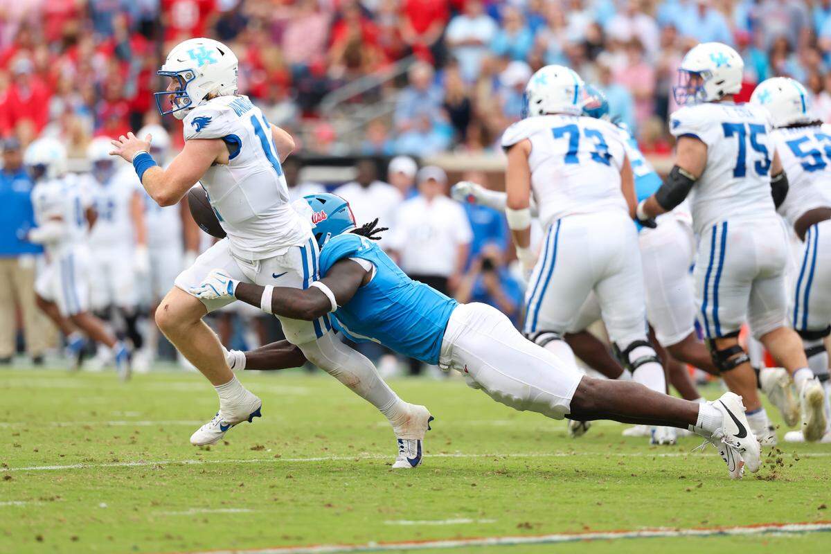 Ole Miss pass rusher Princely Umanmielen defends against Kentucky in a 2024 game.
