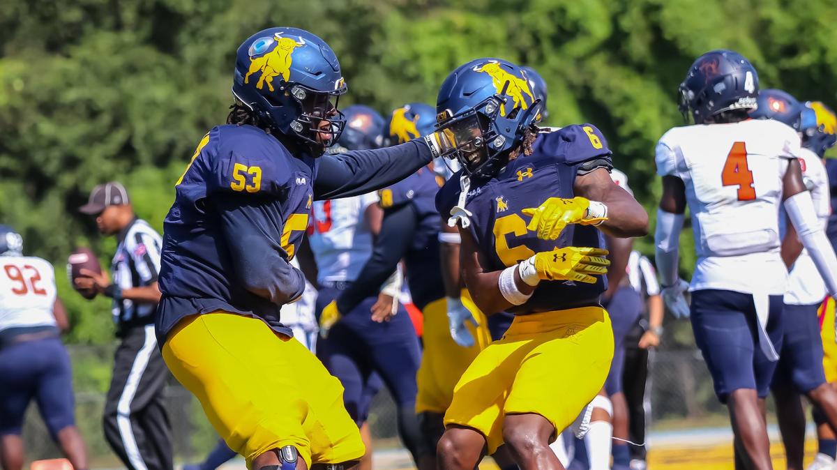 JCSU running back Avante George and Lineman Mohamed Meier celebrate their win against Virginia State at Johnson C Smith University on Saturday October 5th, 2024