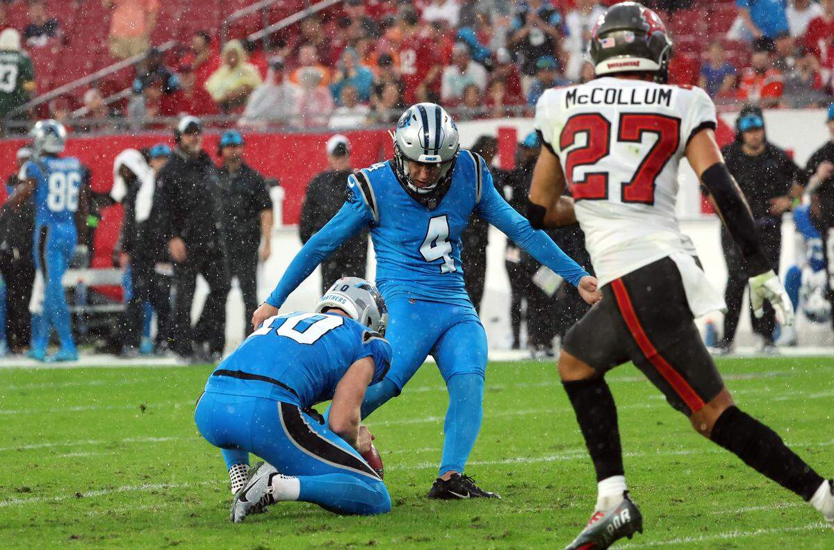 Carolina Panthers place kicker Eddy Piñeiro (4) makes a field goal against the Tampa Bay Buccaneers in 2023.
