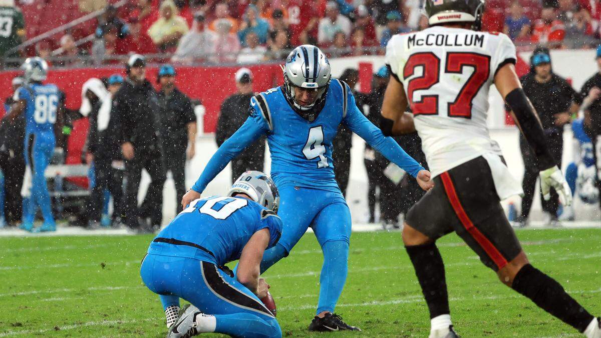 Carolina Panthers place kicker Eddy Piñeiro (4) makes a field goal against the Tampa Bay Buccaneers in 2023.