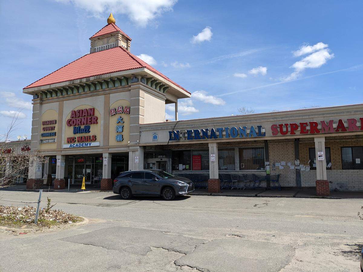 Charlotte developer Beauxwright bought about 10 acres for $8.5 million that includes the center portion of the Asian Corner Mall in NoDa. International Supermarket will close by the end of the year.