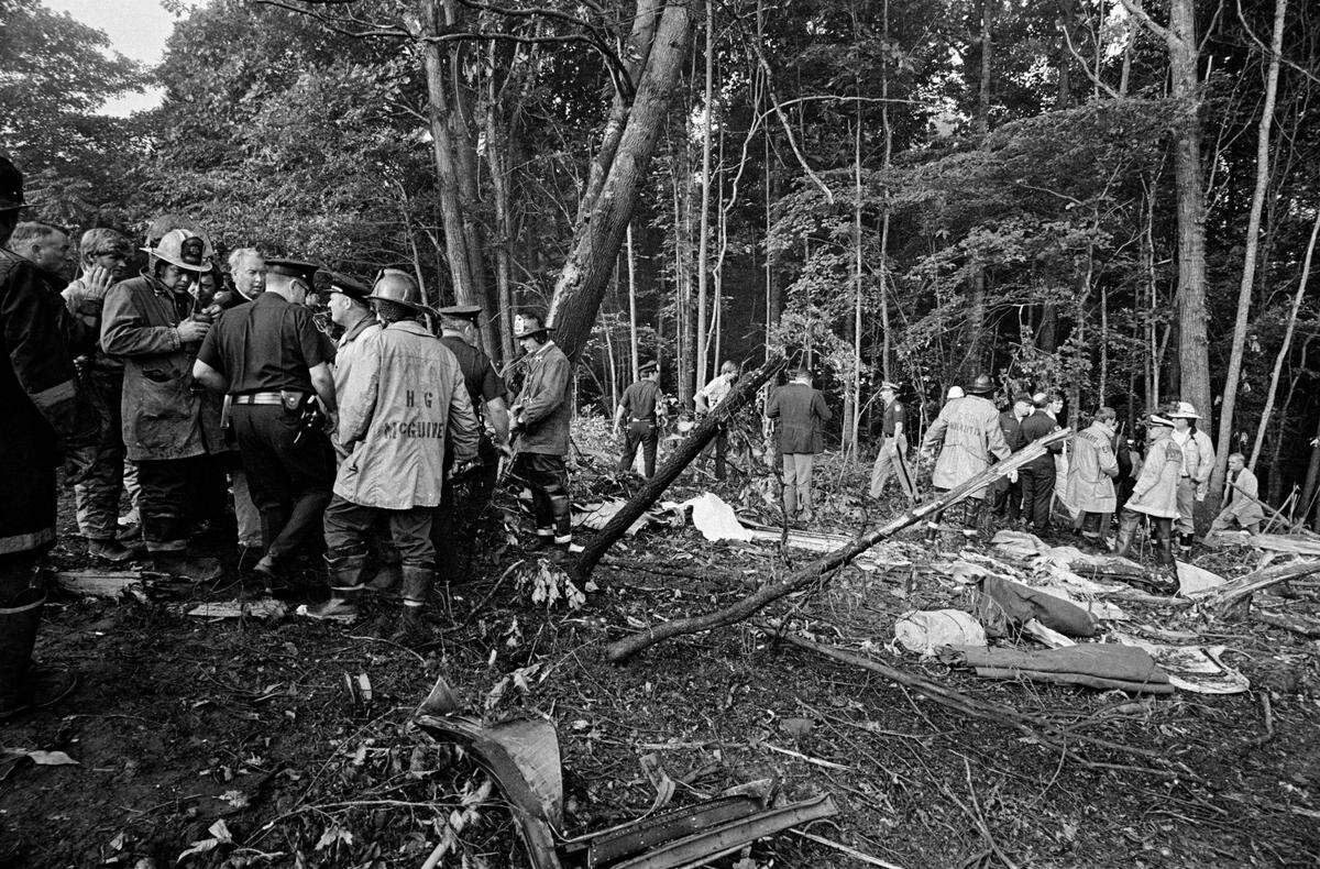 Firefighters on the scene of the crash of Eastern Air Lines Flight 212.
