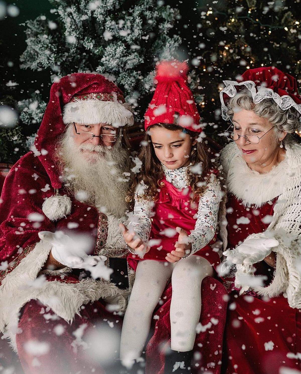 Tim McBride as Santa Claus, with his real-life wife, Debby, as Mrs. Claus.