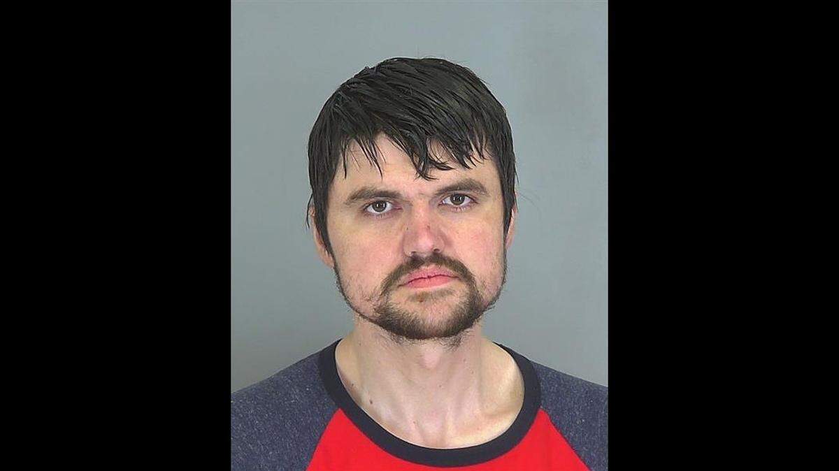 Justin Comer is charged with possession of a stolen vehicle.