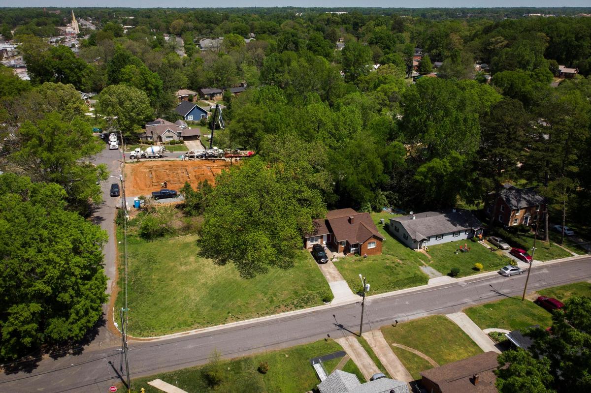 A empty lot at 2028 St. Mark Street where a home used to stand remains empty next to new construction in Charlotte, April 20, 2022.
