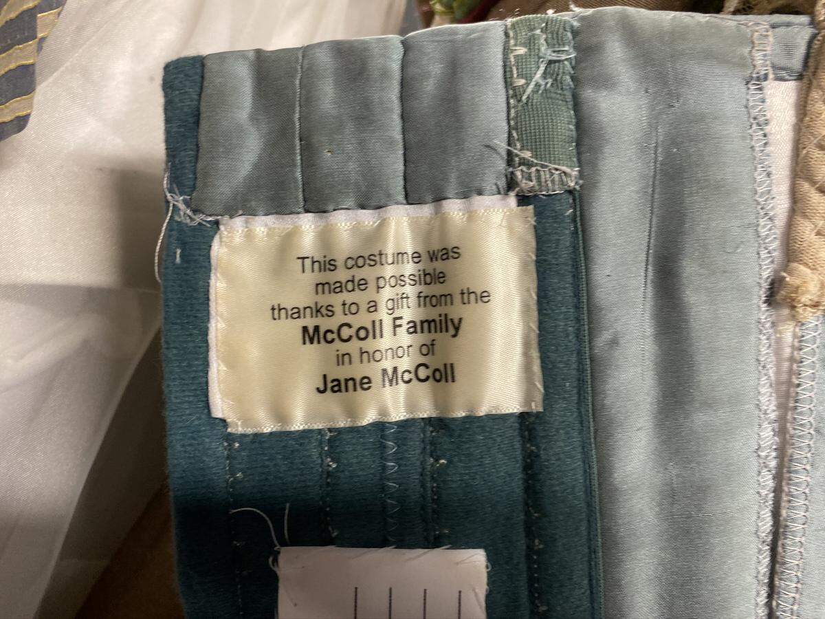Most of the costumes you’ll see onstage in the Charlotte Ballet Nutcracker have this tag sewn inside. That’s because most were purchased with a $1 million gift former Bank of America Chairman Hugh McColl gave the ballet in 2016 in honor of his wife, Jane Spratt McColl.