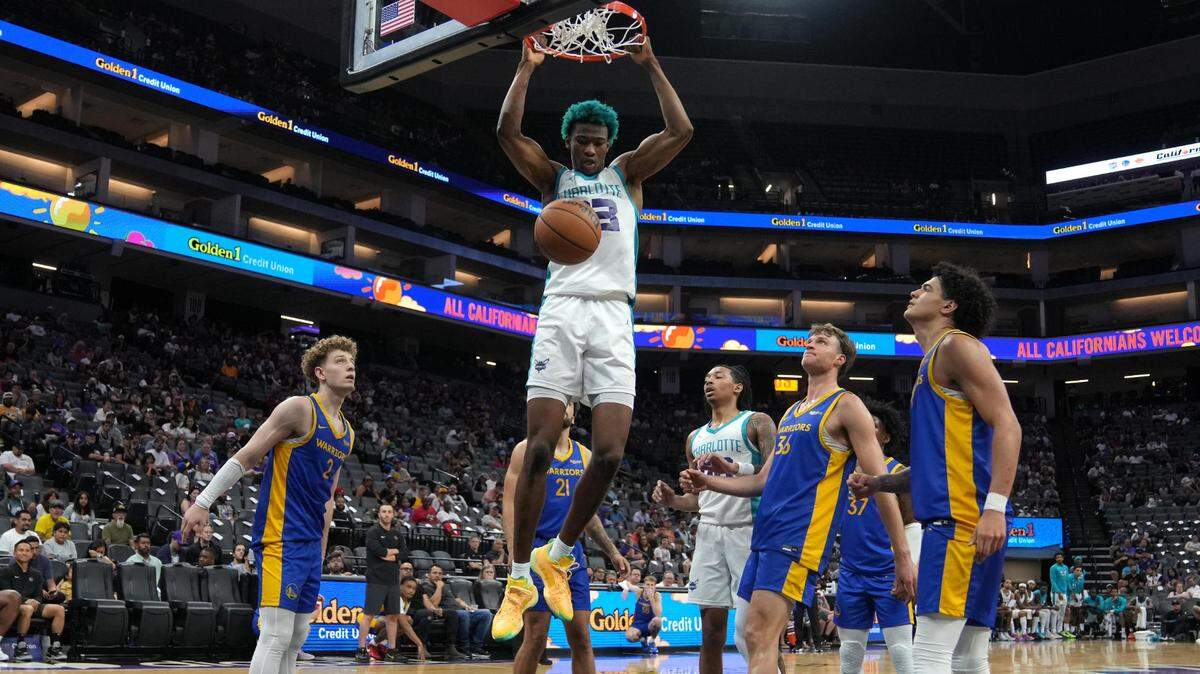 Charlotte Hornets forward Kai Jones (center) dunks against the Golden State Warriors during the fourth quarter at Golden 1 Center.