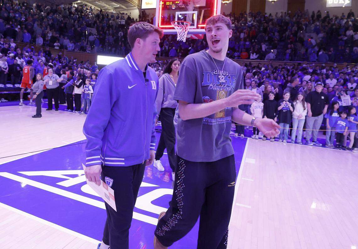 Former Duke stars Kon Knueppel and Cooper Flagg talk as they head off the court after Duke’s 101-64 victory over Syracuse at Cameron Indoor Stadium in Durham on Feb. 16. The two were able to attend the Duke game together during the NBA all-star break.