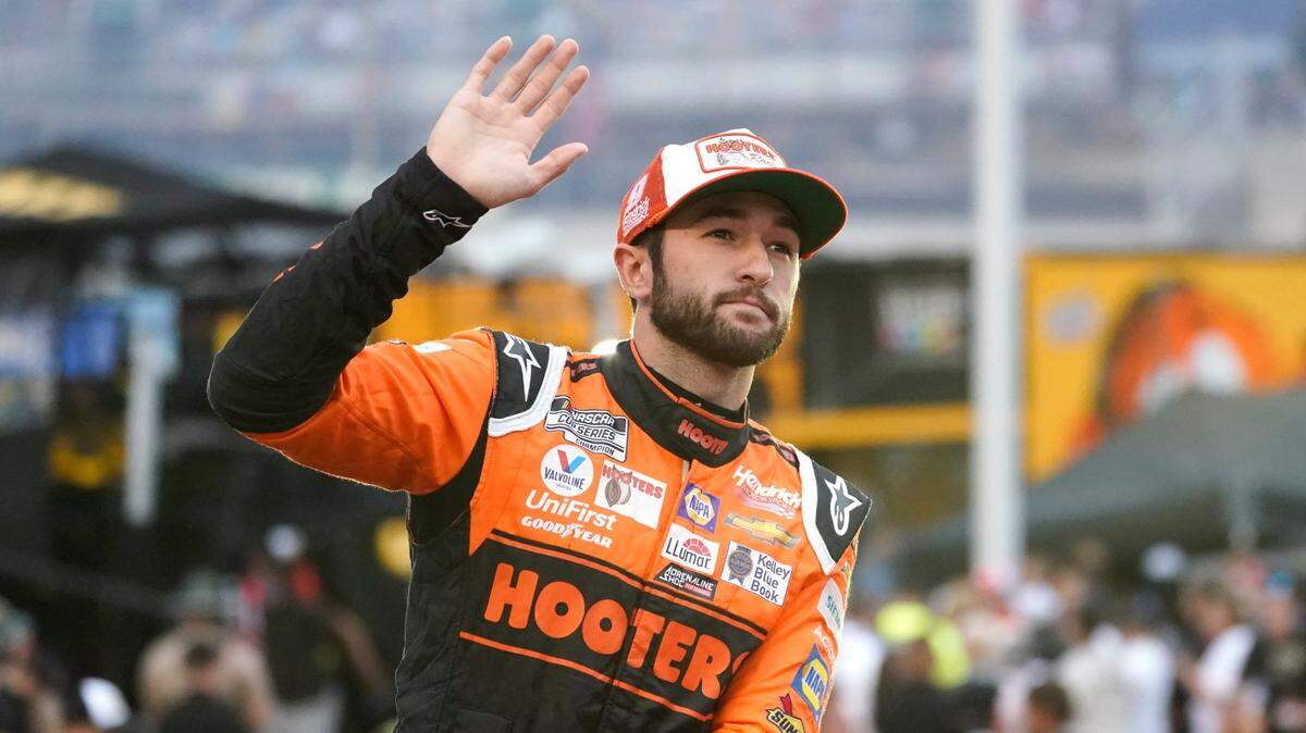 Chase Elliott waves to fans as he is introduced before a NASCAR Cup Series auto race at Bristol Motor Speedway Saturday, Sept. 18, 2021, in Bristol, Tenn. (AP Photo/Mark Humphrey)