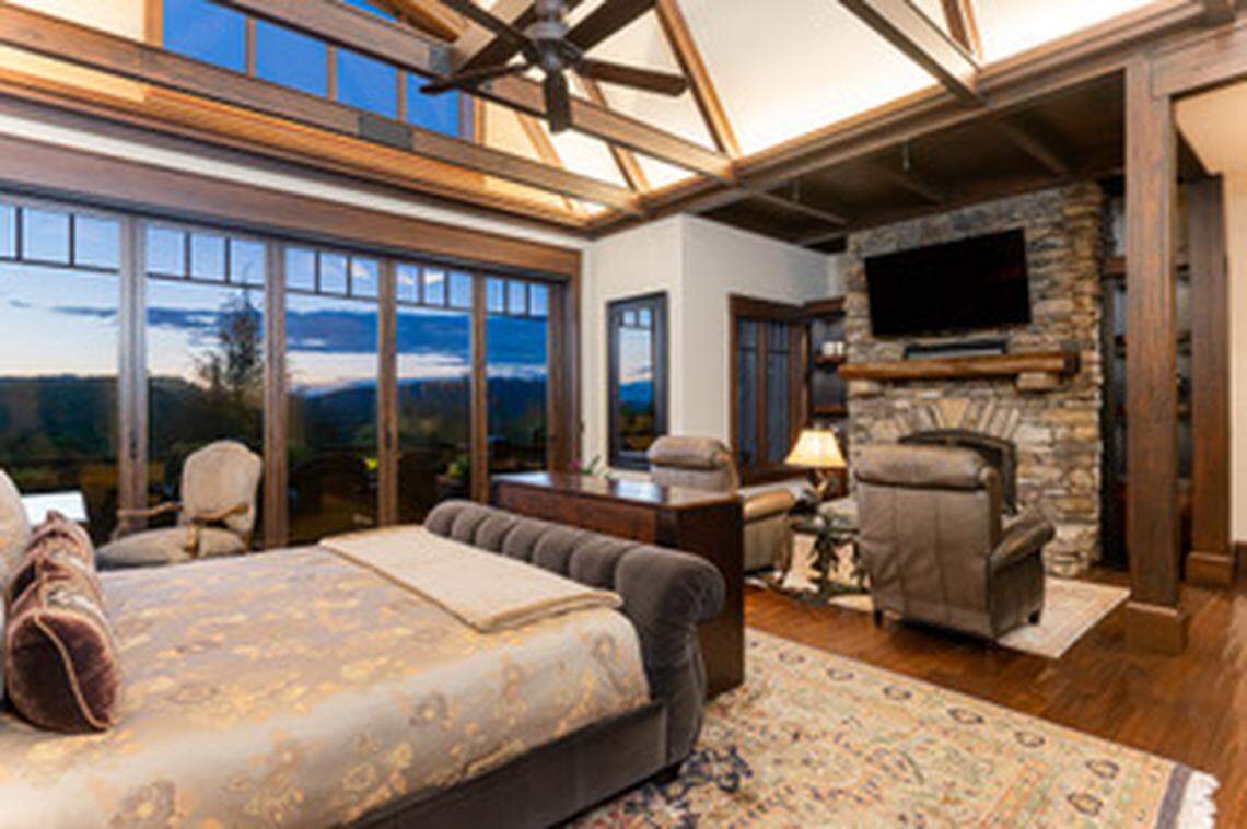 More than 200 feet of NanaWall doors reveal panoramic mountain vistas around the property.