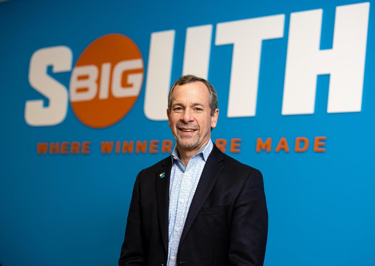 Kyle Kallander, the commissioner of the Big South Conference, stands for a portrait outside at the Big South Headquarters in Charlotte, NC on Friday, December 2, 2022.