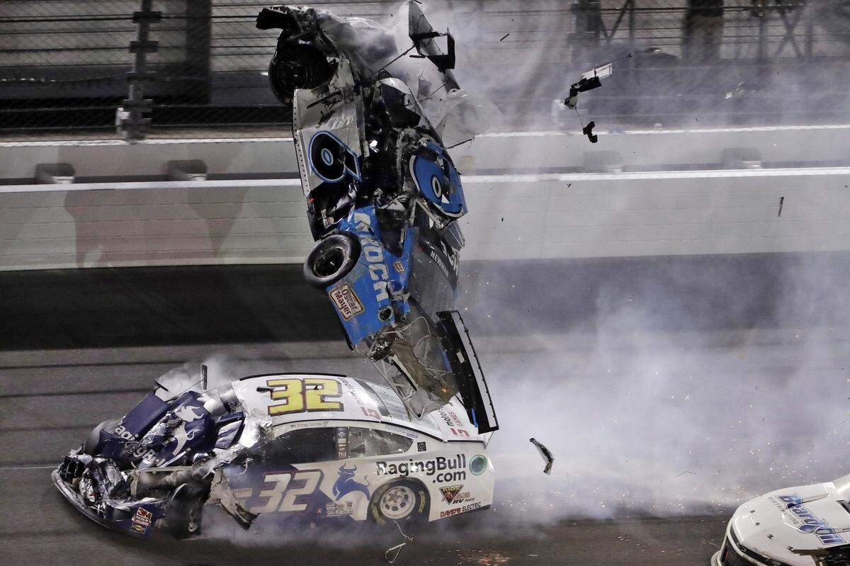 FILE - In this Monday, Feb. 17, 2020, file photo, Ryan Newman (6) goes airborne after crashing into Corey LaJoie (32) during the NASCAR Daytona 500 auto race at Daytona International Speedway in Daytona Beach, Fla. Newman, who suffered a head injury in the season opening Daytona 500, will race Sunday, May 17 when NASCAR resumes its season at Darlington Raceway. (AP Photo/Chris O’Meara, File)