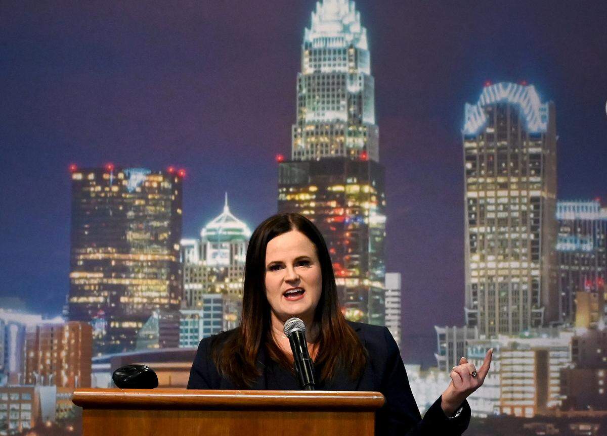 Kelly Garraghan Weeks speaks to the Rotary Club of Charlotte on Tuesday.