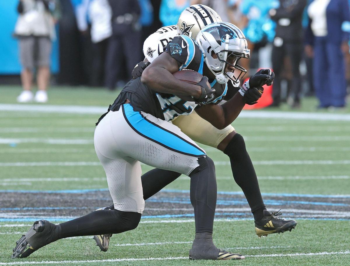Carolina Panthers wide receiver Xavier Legette secures a pass from quarterback Bryce Young over the middle during fourth quarter action against the New Orleans Saints at Bank of America Stadium in Charlotte, NC on Sunday, November 3, 2024. The Panthers defeated the Saints 23-22.