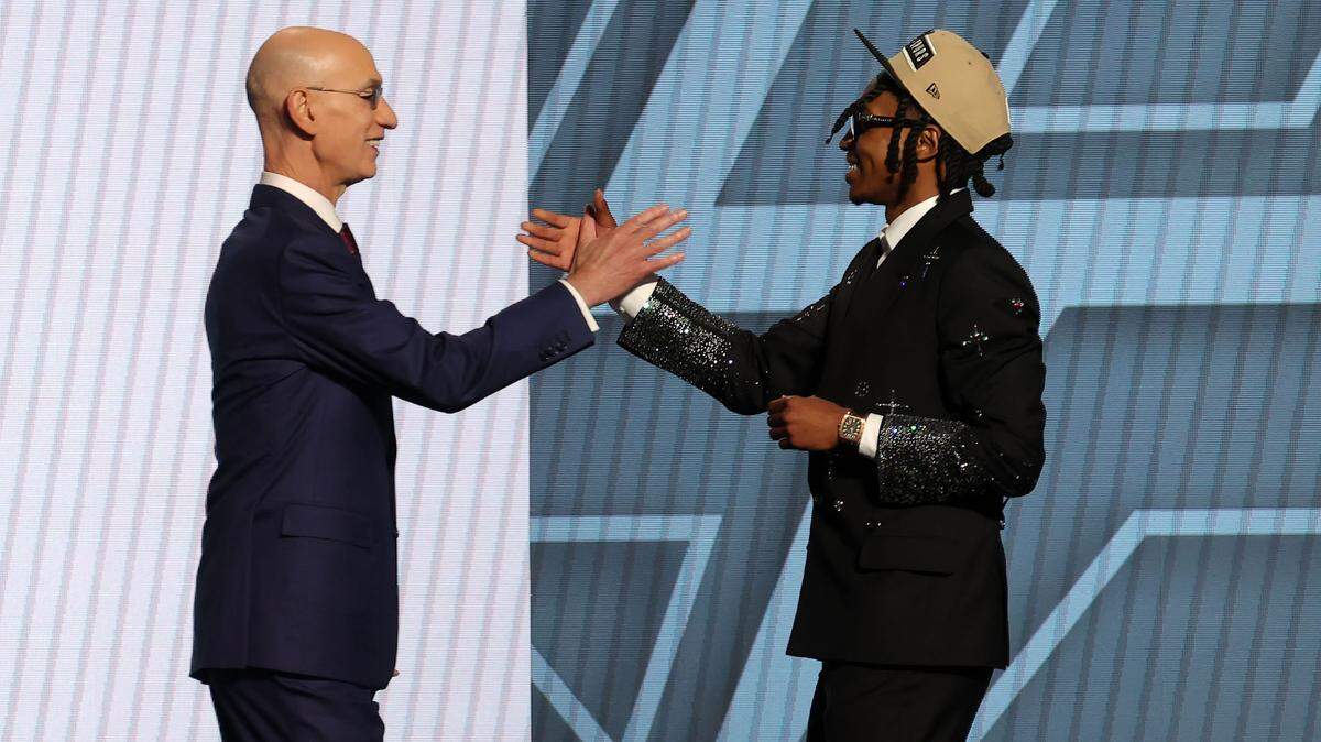 Rob Dillingham shakes hands with NBA commissioner Adam Silver after being selected in the first round by the San Antonio Spurs in the 2024 NBA Draft at Barclays Center. Brad Penner-USA TODAY Sports