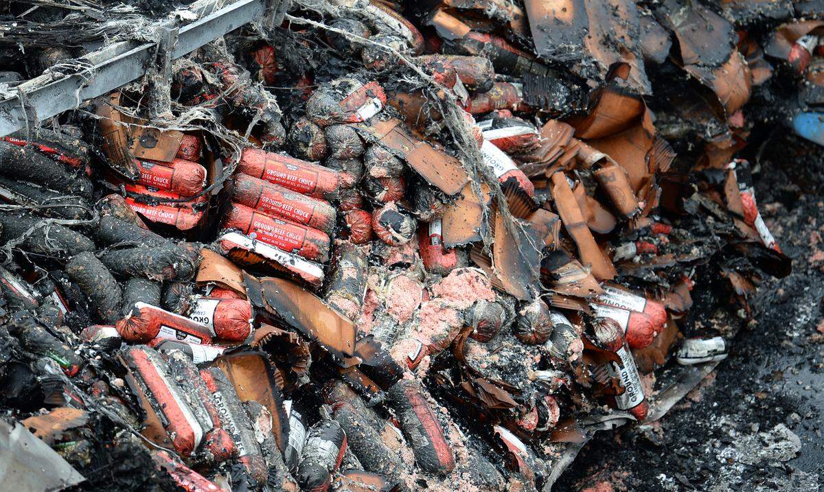 Packages of Ground Beef Chuck are among the items destroyed when a tractor-trailer burst into flames near uptown Charlotte on Tuesday.