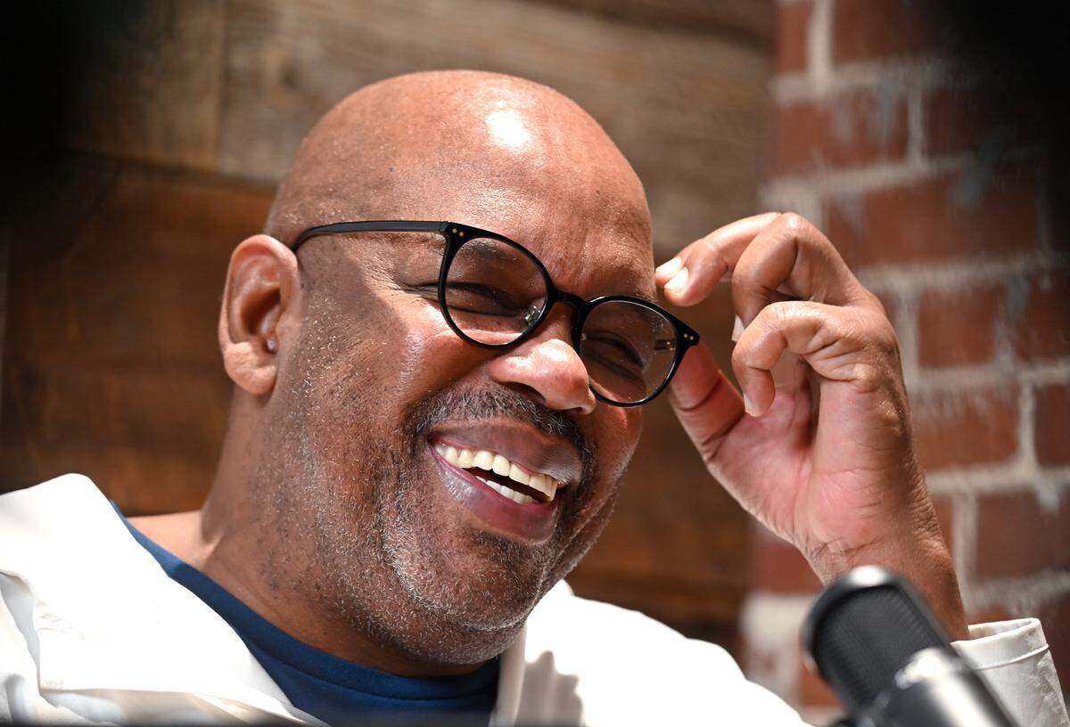 Former NBA star Cedric Maxwell laughs as he responds to a question during an interview on Tuesday, January 17, 2023. Maxwell starred in the NBA for the Boston Celtics, Houston Rockets and Los Angeles Clippers. Maxwell now works in radio broadcasting announcing Celtics games.