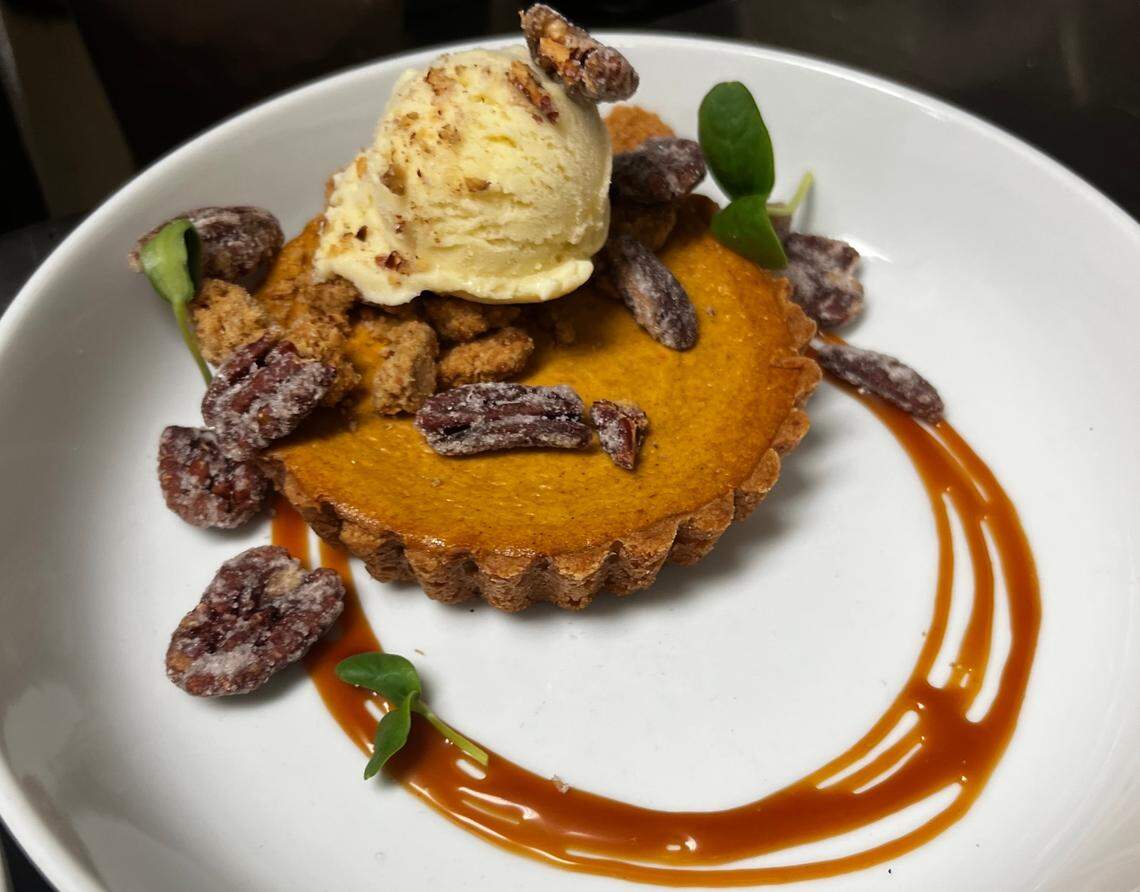Jonathan Shuler, executive chef at Dilworth Tasting Room, makes pumpkin cheesecake at Thanksgiving.