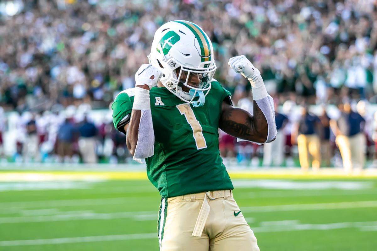 Charlotte 49ers freshman Durell Robinson celebrates during Saturday’s game with South Carolina State