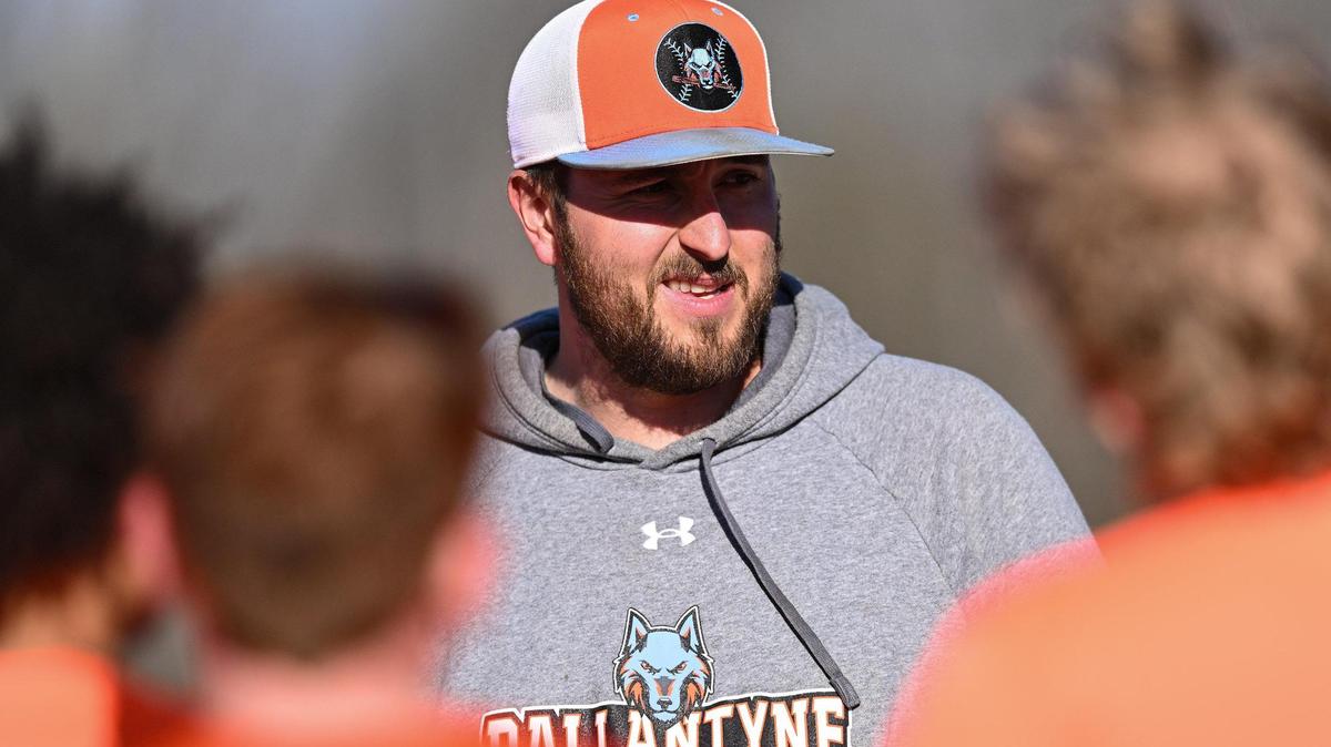 Ballantyne Ridge head coach Mike Ladka speaks to players during a high school baseball practice, Thursday, March 20, 2025, in Charlotte, N.C. (Charlotte Observer/Matt Kelley)