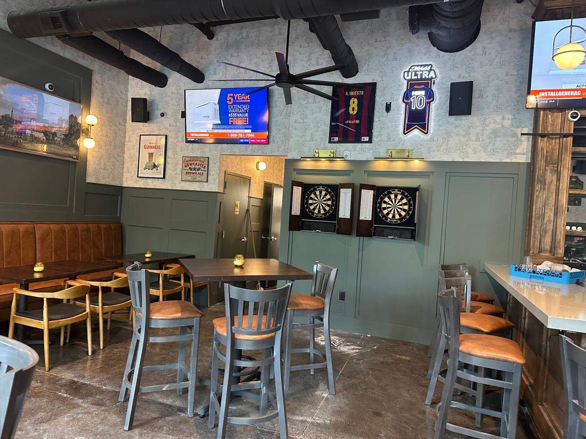 At The Pub at Uptown, you can play darts while you catch a game.