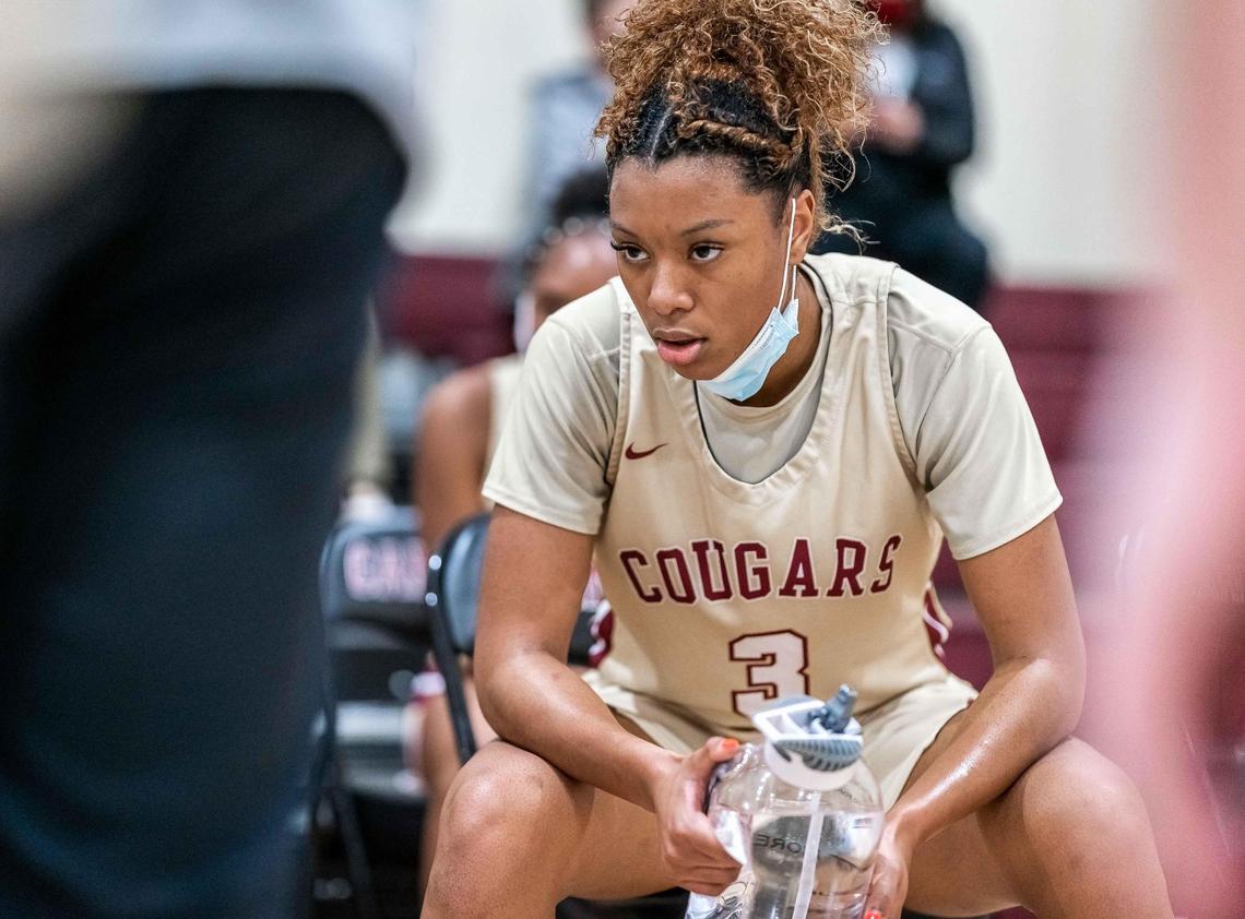 Cannon’s Reigan Richardson (3) receives instruction from head coach Kelvin Drakeford. Cannon would host North Raleigh Christian in the NCISAA State Championship game Saturday Feb 27, 2021.