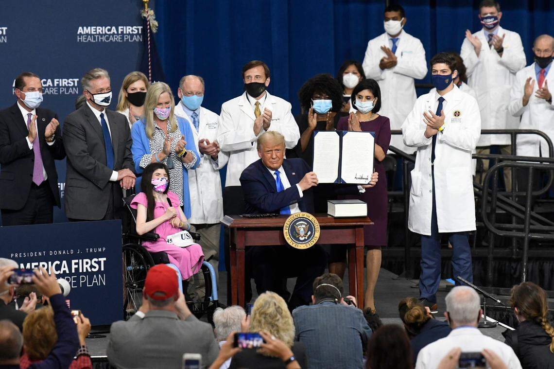 President Donald J. Trump shows off an an Executive Order he signed for the America First Healthcare Plan e in Charlotte on Thursday, September 24, 2020.