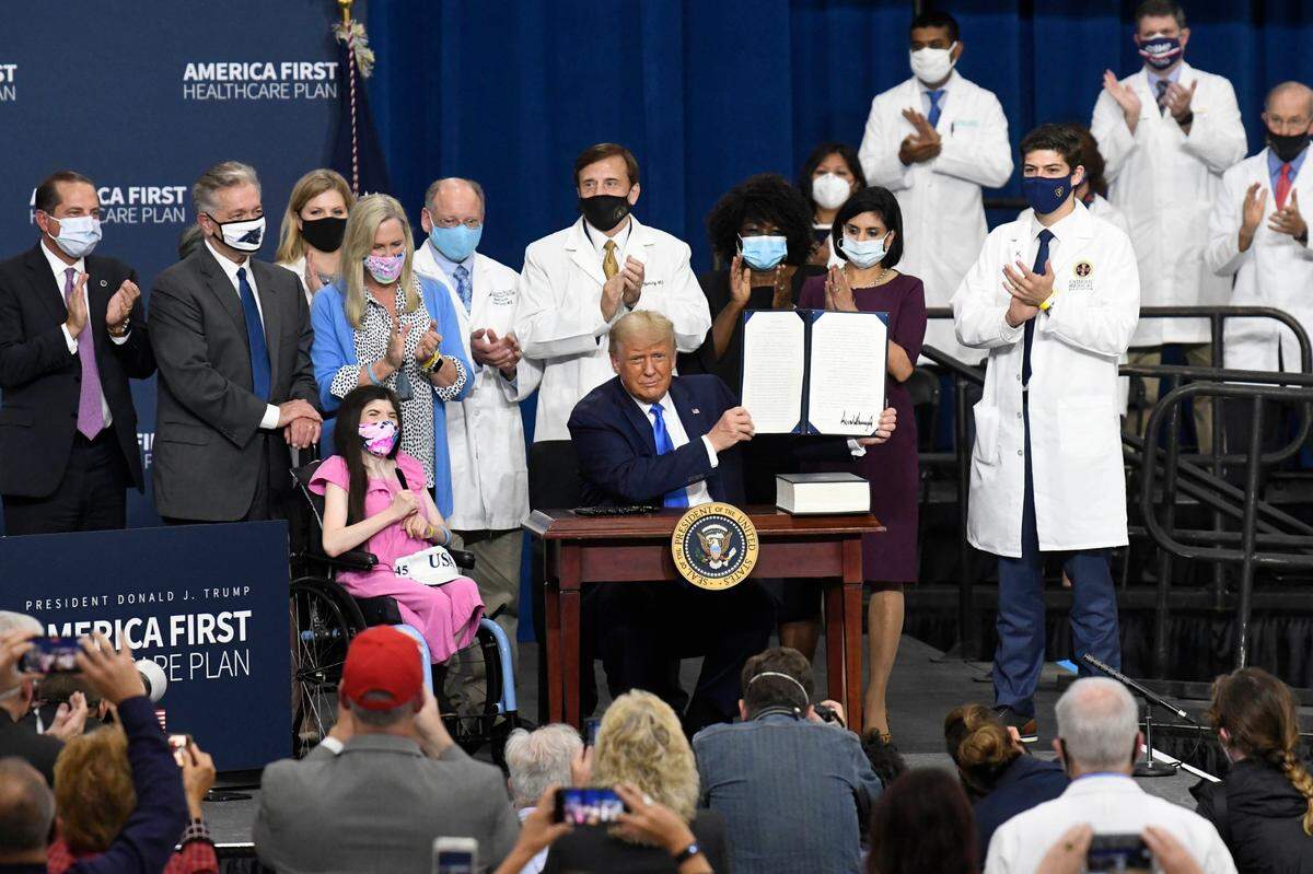President Donald J. Trump shows off an an Executive Order he signed for the America First Healthcare Plan e in Charlotte on Thursday, September 24, 2020.