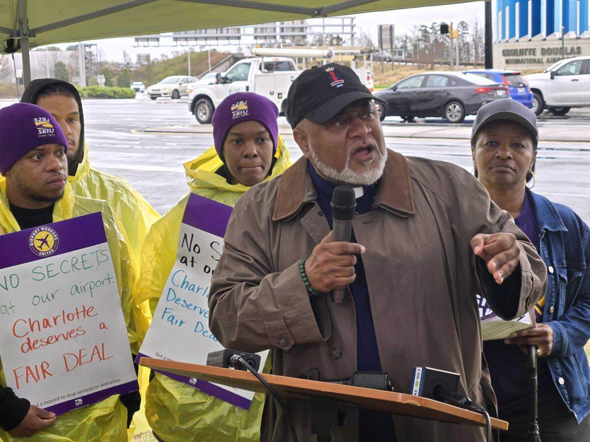 Rep.-elect Rodney Sadler of House District 106 makes a push for higher wages for Charlotte airport workers.
