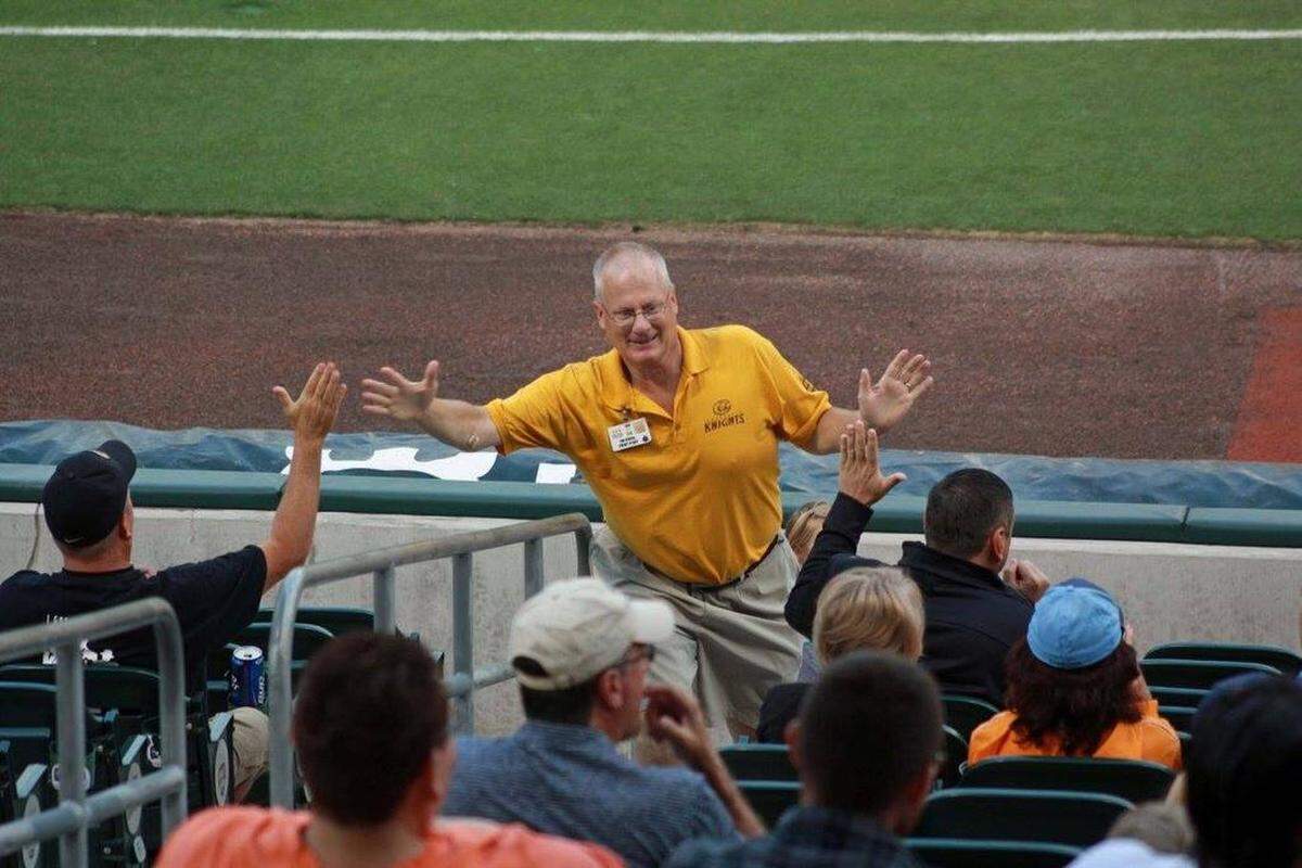 “When my children were younger, we used to go to some of the Winthrop baseball games,” says Jim Kobos, shown here at a Knights game in uptown Charlotte. “And there was a gentleman there... every time Winthrop hit a home run, he would jump up and yell, ‘Hey, hey, hey!’ And walk around and get high-fives from people. ... I incorporated his influence.”