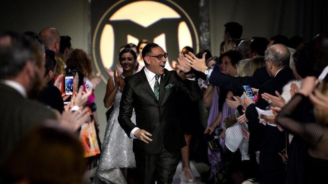 This designer dresses the mayor, and some Charlotte A-listers. How? He works it. Every day.