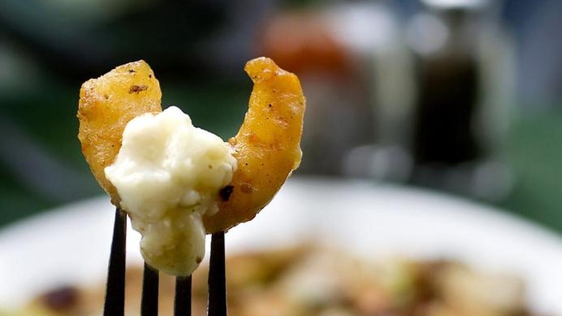 Crook’s Corner has elevated the Lowcountry dish of shrimp and grits to fine Southern cuisine.