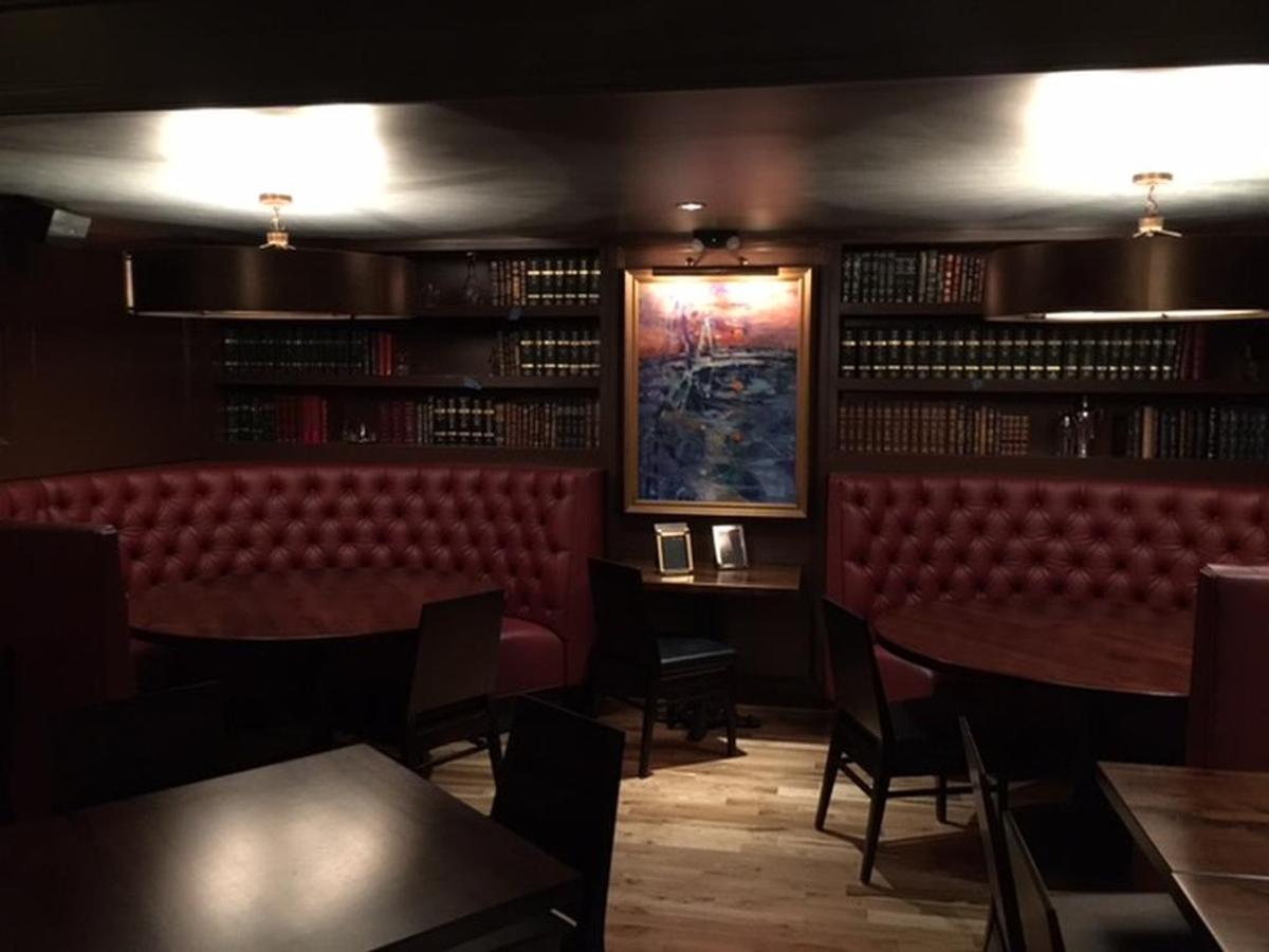 If you’re planning to Instagram those drinks, you’ll need to bring a selfie light: The look is luxe, low and dark.