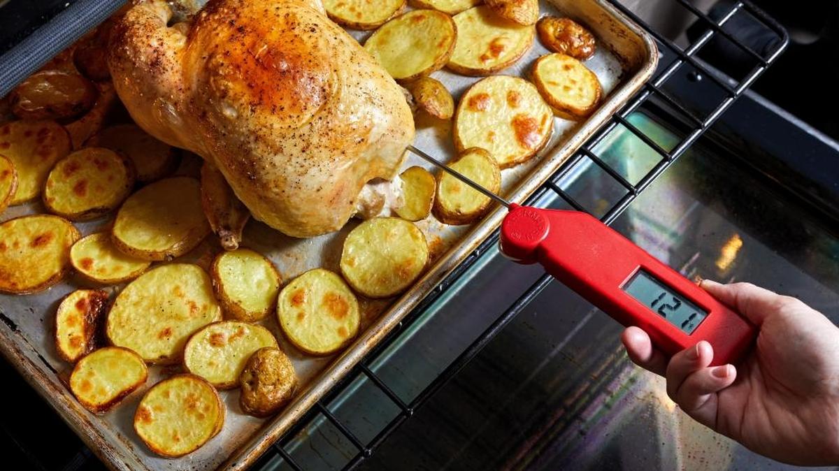 A instant-read thermometer will help you accurately gauge when your meal, such as a whole chicken, is properly cooked.