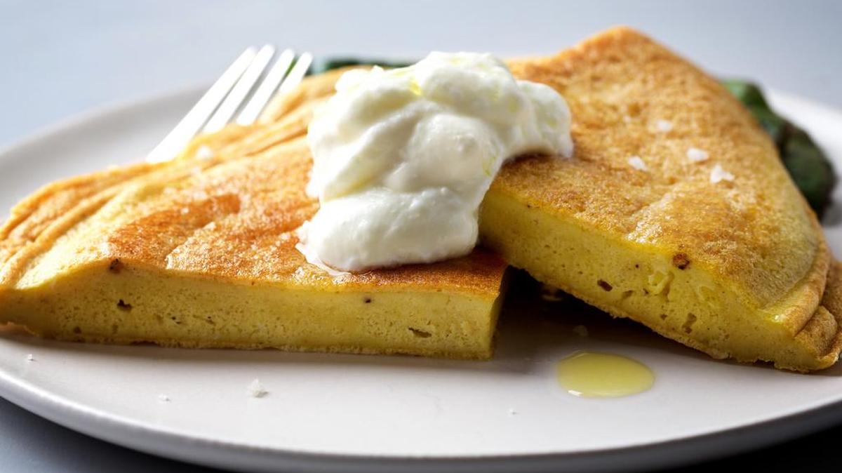Omelet using chickpea flour has all kinds of uses for a fast dinner.